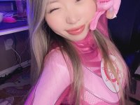 Gorgeous Asian solo girl with large boobs sticks out her tongue - Photo #6