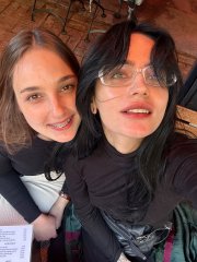 Lesbian couple Maria J and Ophelia strip totally naked while fooling around