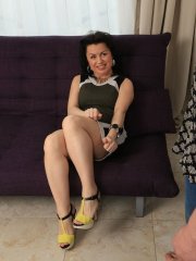 Mature sexy Nataly giving a hot footjob & sucking young man's big cock