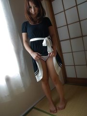 Asian MILF Ayumi Chiba undressing and exposing her pussy in close up