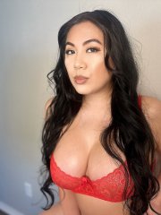 Chubby Asian Laci Aioki removes her panties and shows off her shaved pussy