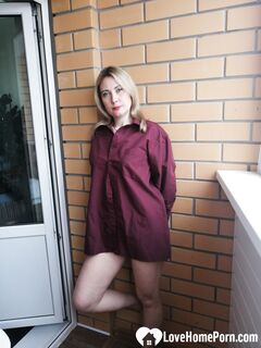 Incredible MILF displaying her tits by the window