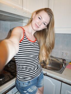 Lovely small-breasted beauty taking some naughty selfies