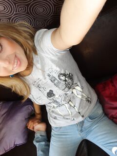 Lovely teen stripping off her blue dress