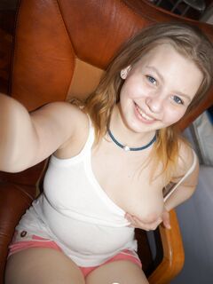 Busty girlfriend exposes her tits to the camera