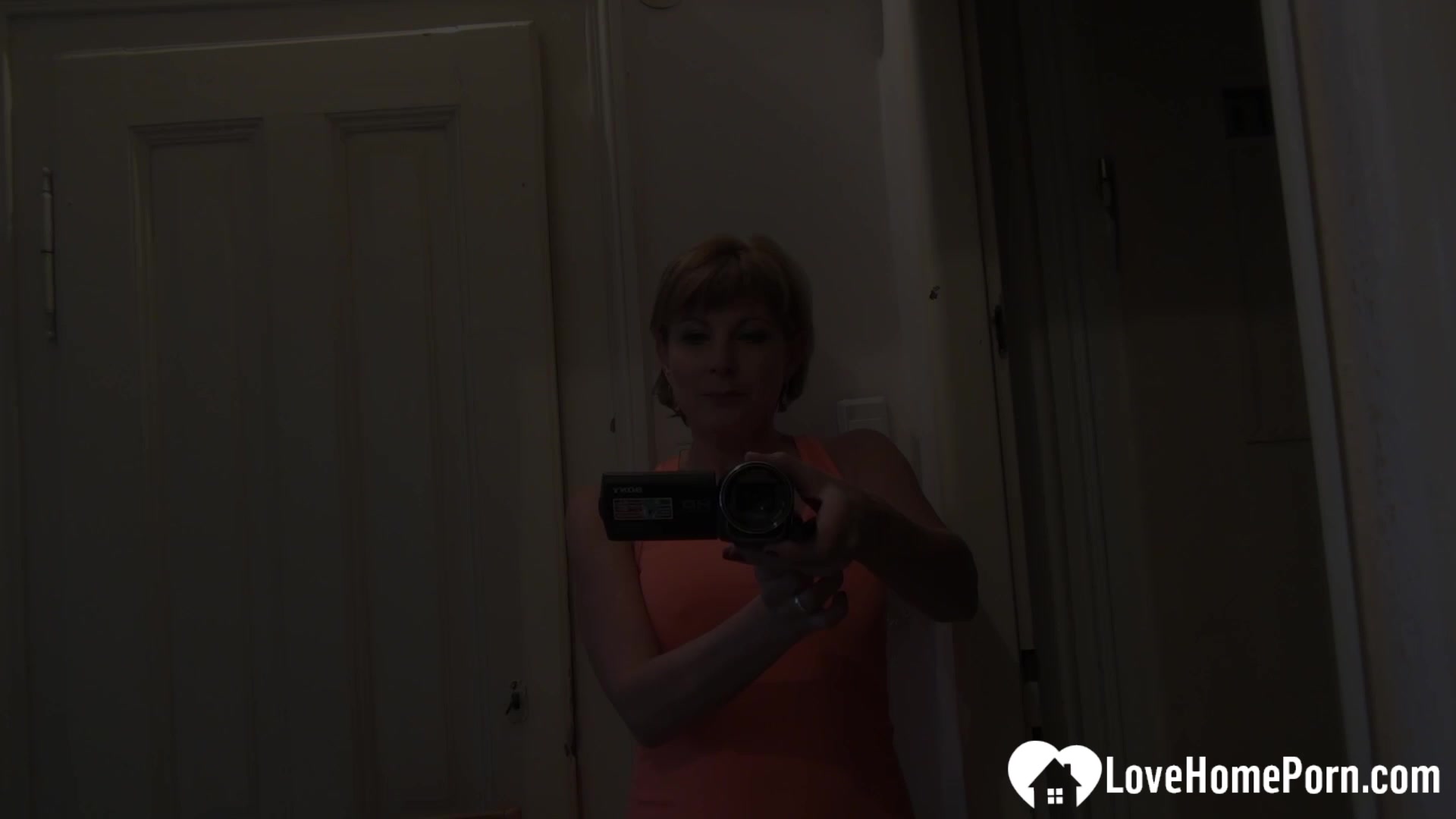 Solo chick filming herself while masturbating passionately